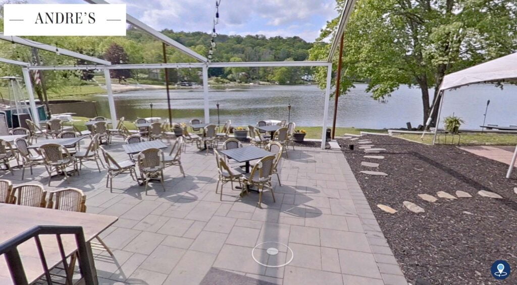 A view of a lake-side dining area at a restaurant.